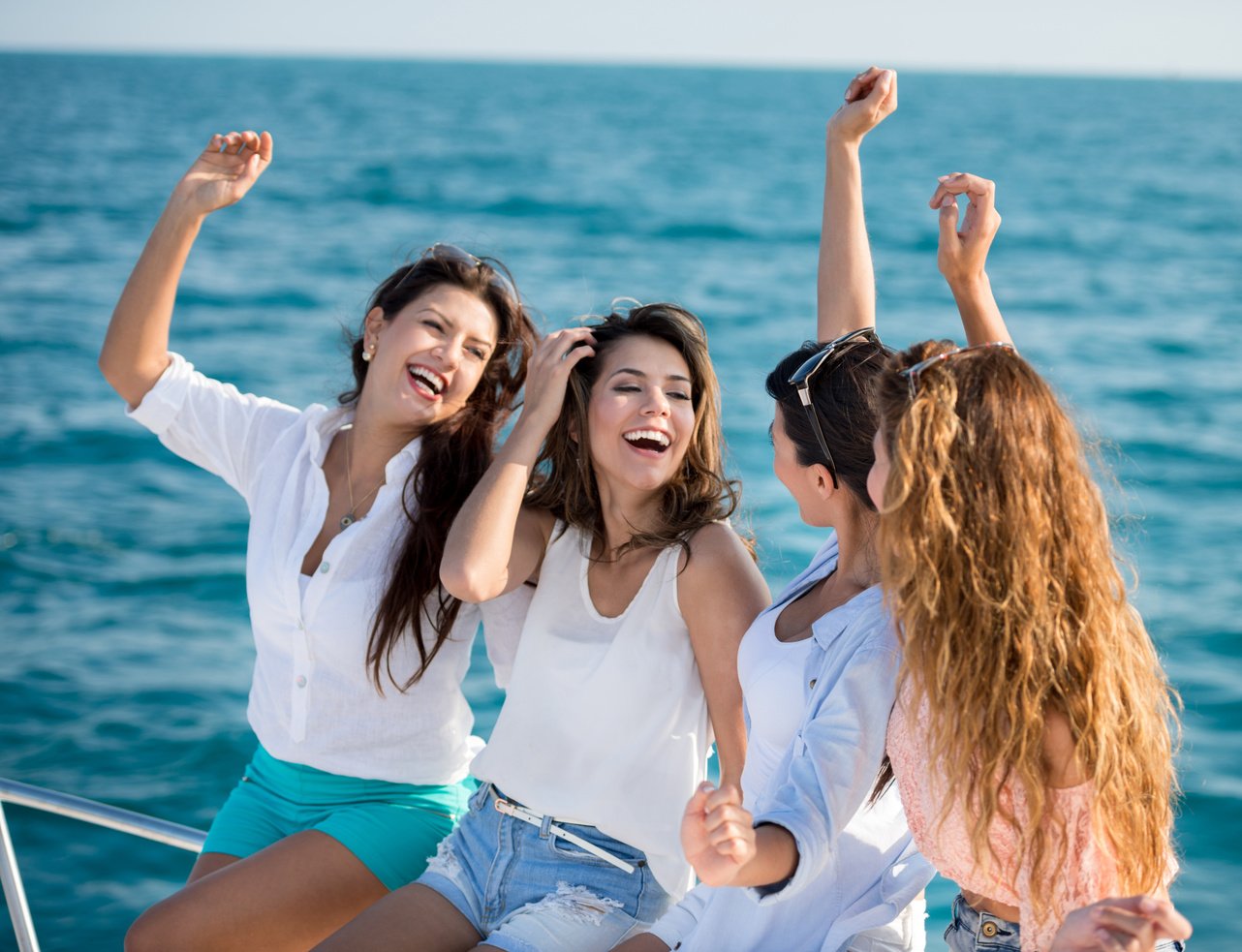 Women on a bachelorette party at a boat